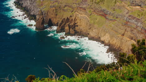 Slow-motion-wide-shot-of-rocky-coastline-from-high-viewpoint