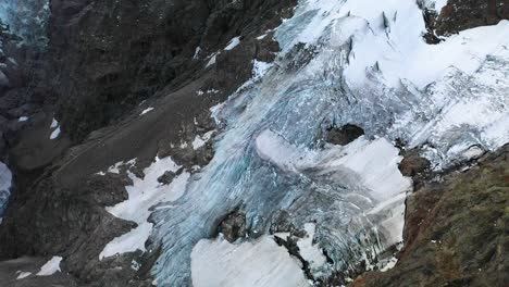 drone shot over a melted glacier that is almost gone