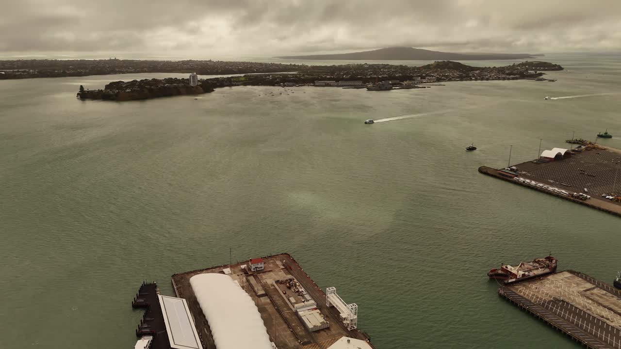 Bird's eye view of Auckland City Harbour with the ferry arriving.
