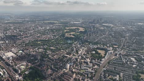 Establishing-Aerial-fly-drone-View-of-Gherkin-skyscraper-with-London-Skyline,-20-Fenchurch-or-Walkie-Talkie,-sky-garden-by-the-Thames-River,-United-Kingdom,-Europe