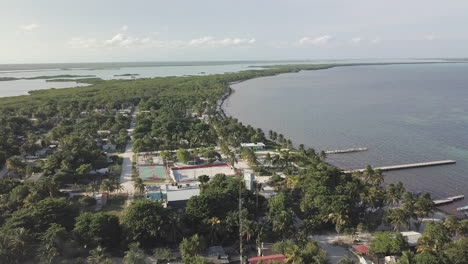 drone aerial fly over footage overlooking punta allen town, mexico