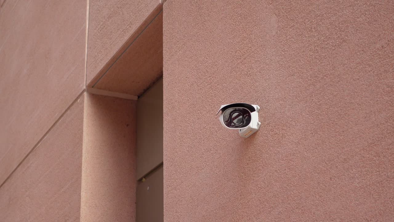Security Camera on a Building Wall