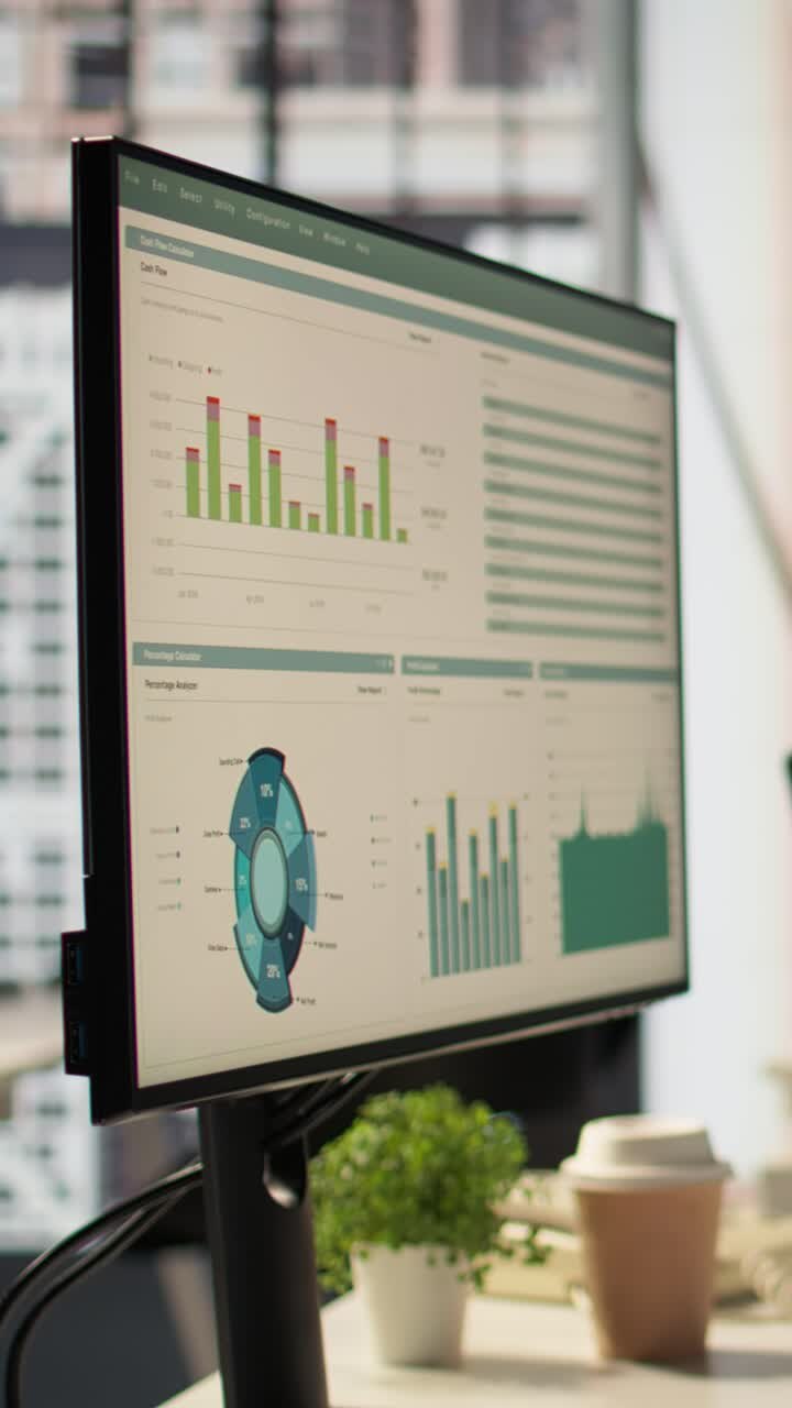 Dataskjerm viser forretningsdiagrammer og finansielle data