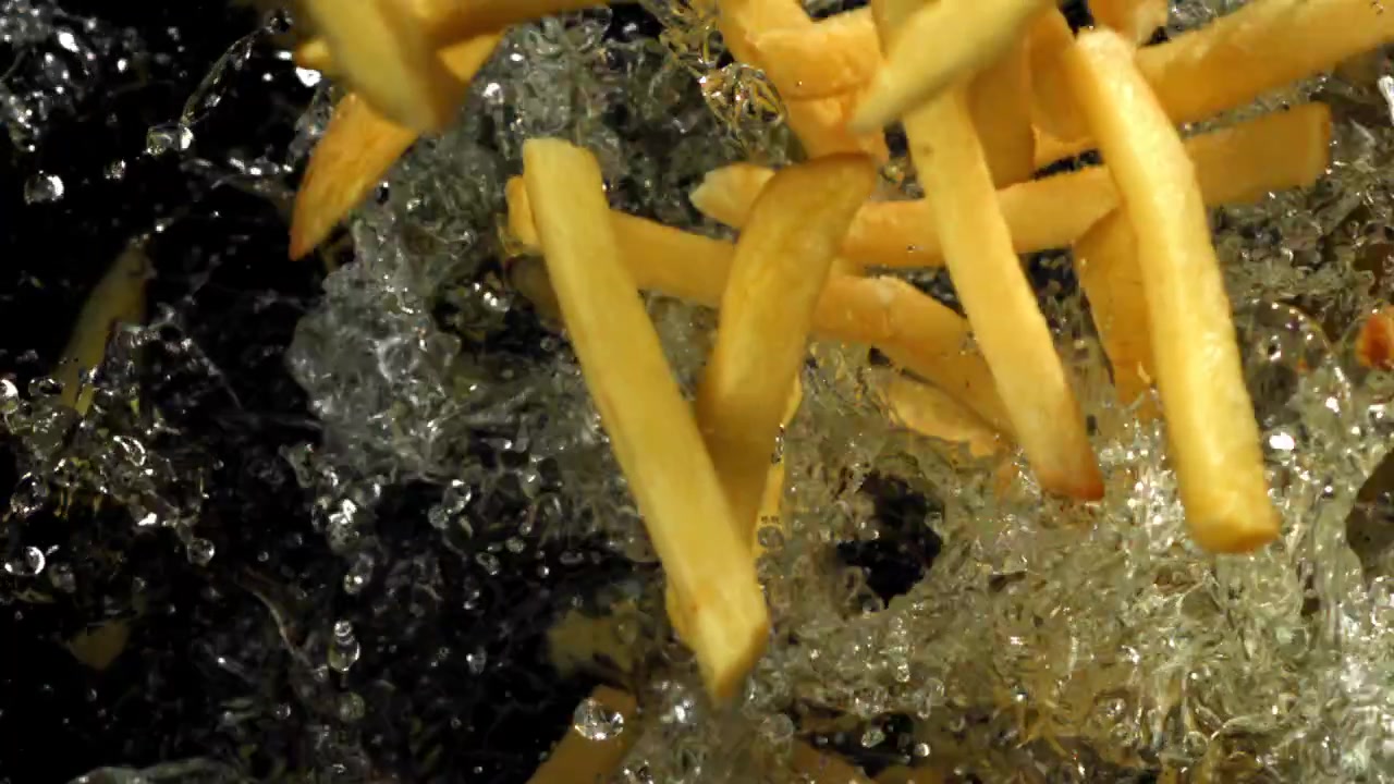 Golden French Fries Deep Frying in Hot Oil