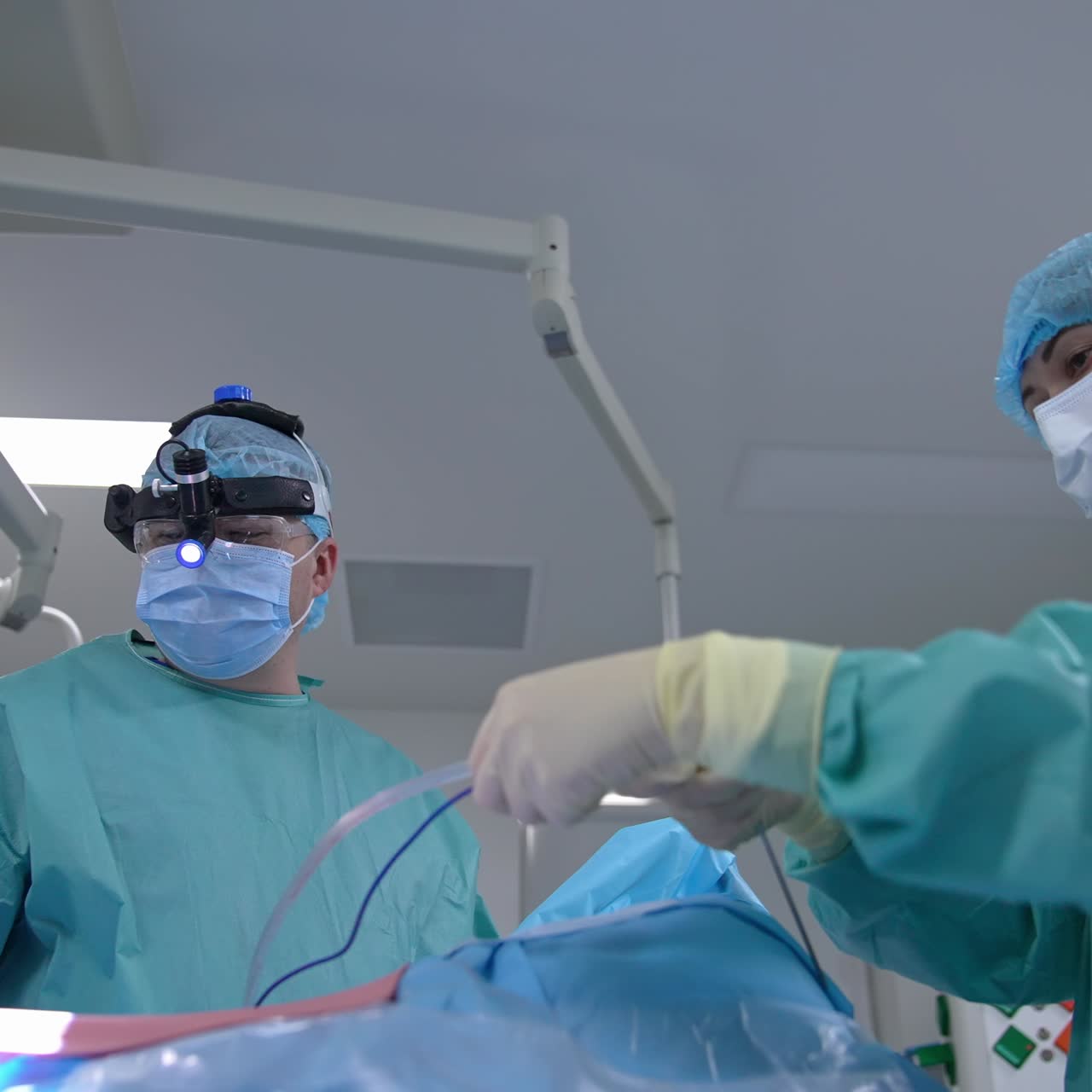 Team surgeon at work in operating emergency ward. Neurosurgeon doctor in operating room