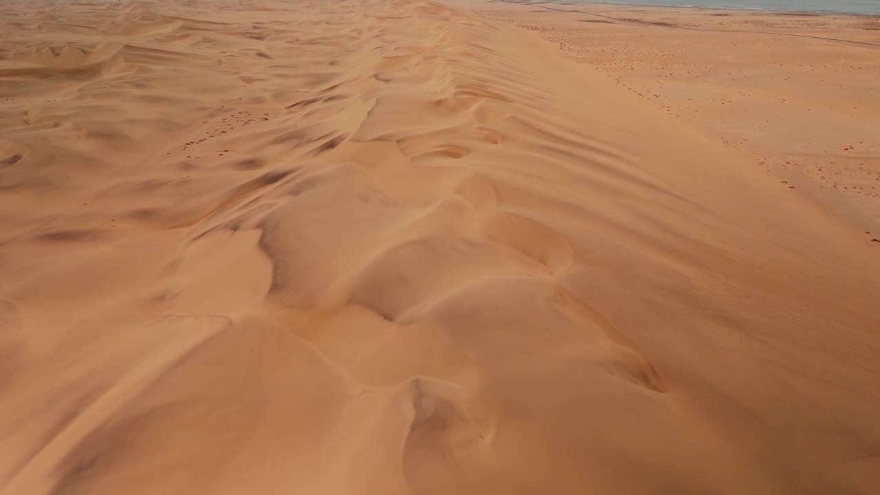 Aerial view of sand dunes and coastline
