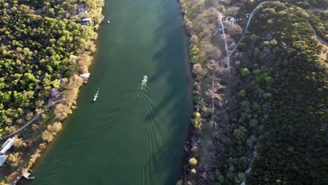 Boats-Pass-through-Lake-Austin,-Colorado-River