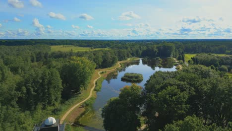 observatory next to lake in peaceful panorama landscape of hamont achel belgium