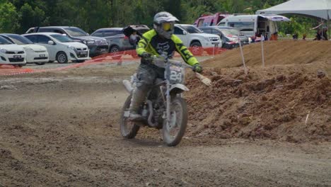 motocross rider on dirt track
