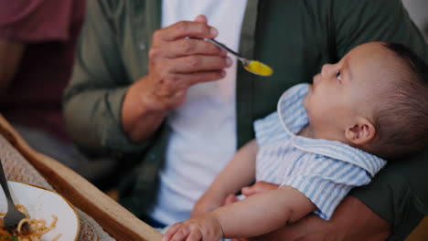 happy, healthy and man feeding baby with food