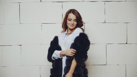 stylish woman in studio. young stylish woman posing in studio