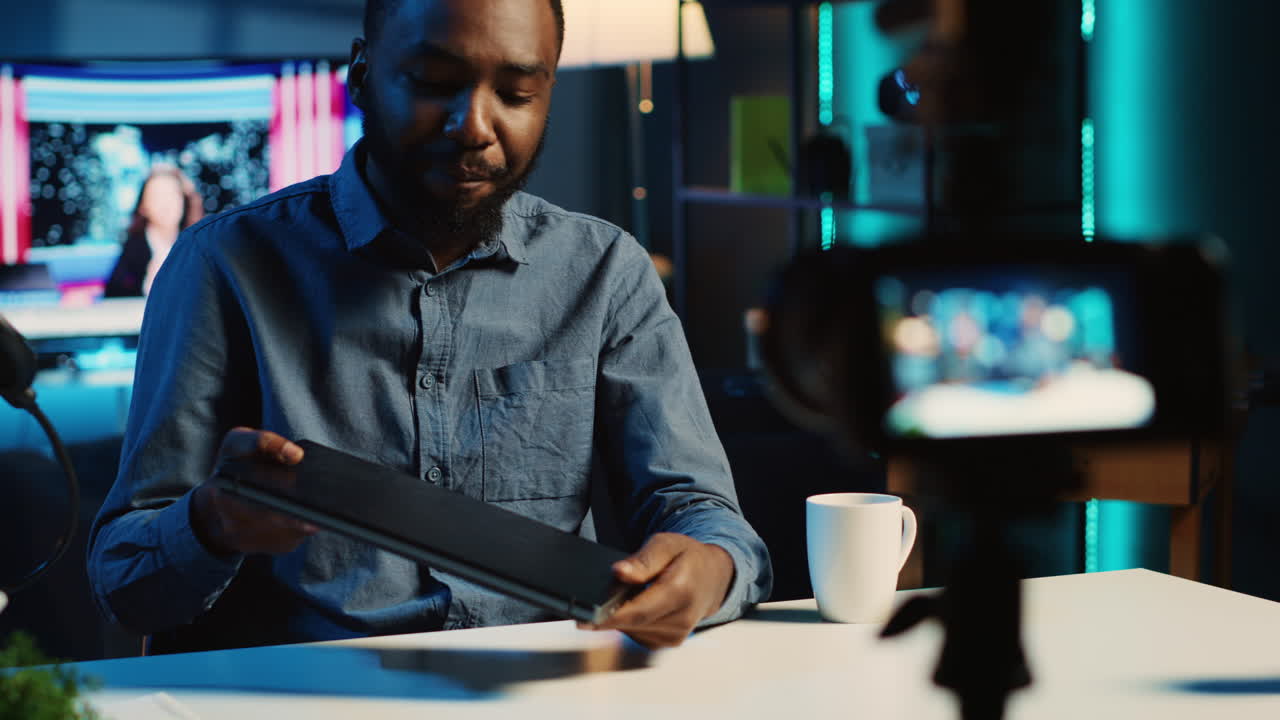 Content creator reviewing laptop