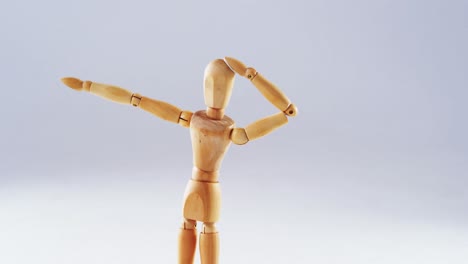Figurine-dancing-on-white-background