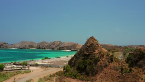 the white sand beach of tanjung aan in lombok, indonesia during a sunny day