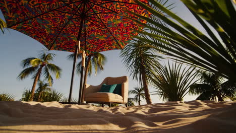 tropical beach setting with armchair and colorful umbrella