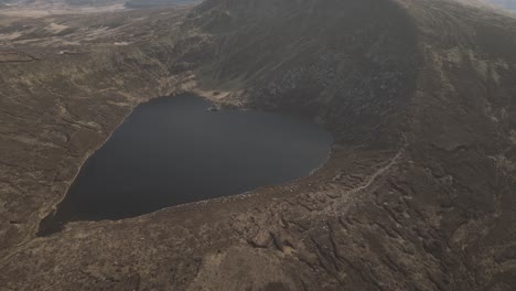 heart-shape lake of lough ouler at wicklow mountains in ireland