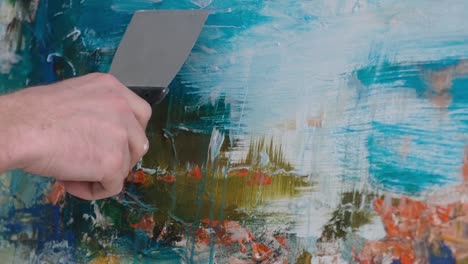 super slow motion 240 fps the artist paints an abstract picture in the studio - super slow motion 240 fps, the artist paints an abstract picture in the studio. a modern artist paints an emotional, sensual oil painting