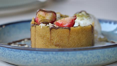 delicious semolina halva with strawberries, chocolate, and ice cream
