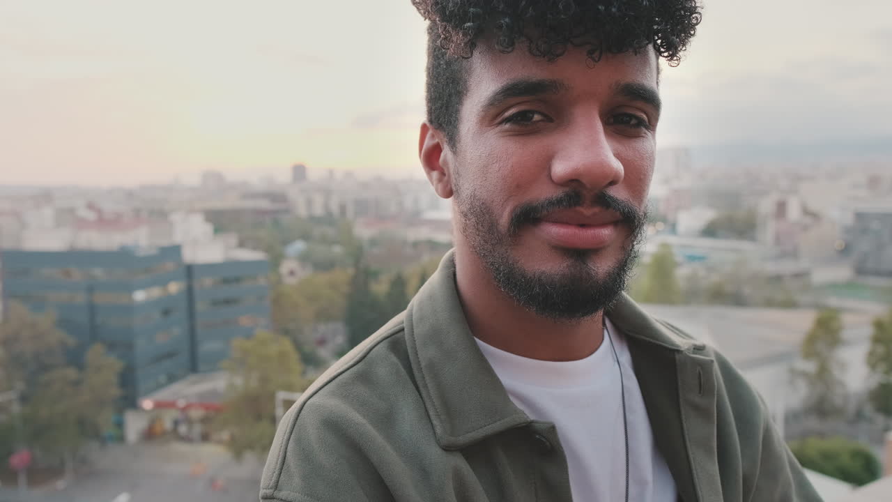 Portrait of a smiling man in an urban setting