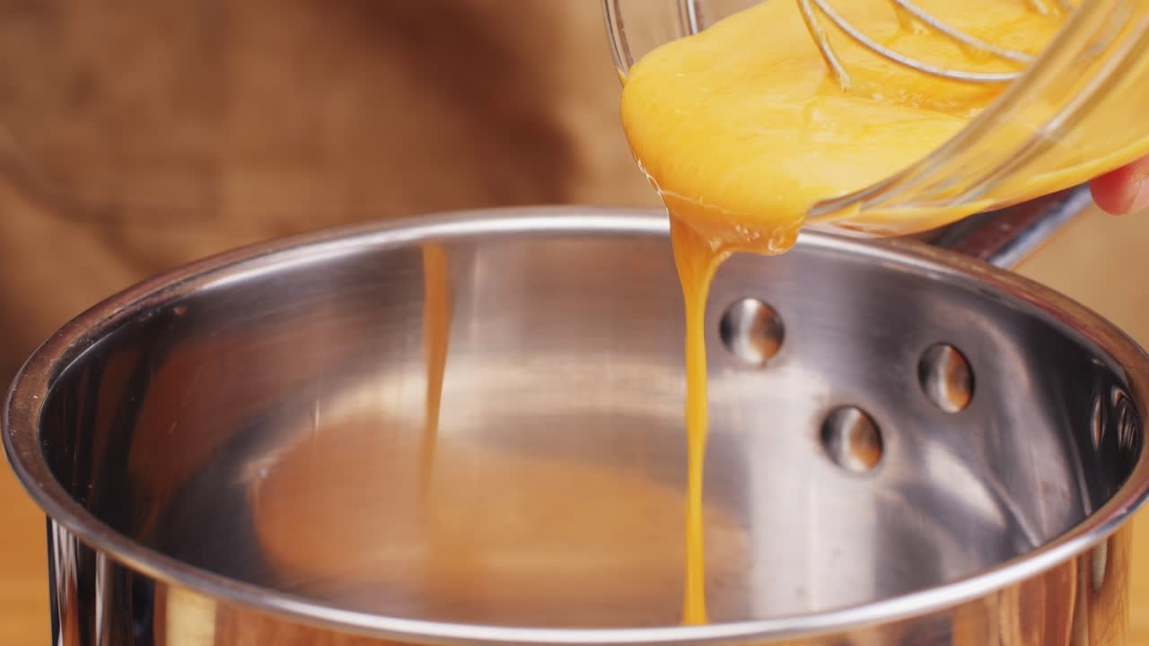 Chef Cooking Spanish traditional food, catalonian dessert, crema catalana, catalan cream, spanish dessert close up, cooking.