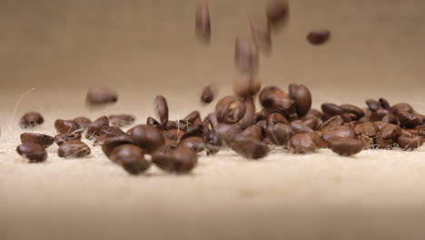 Coffee-beans-falling-on-jute