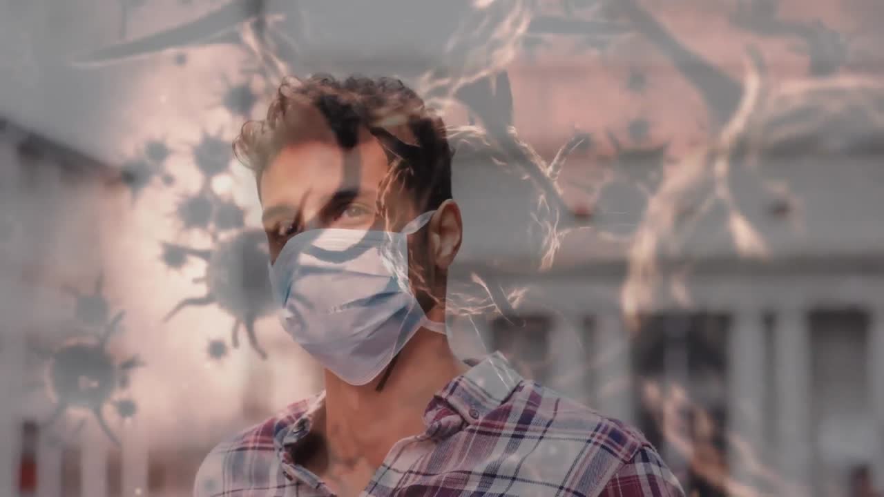 코로나19 세포가 얼굴 마스크를 쓰고 있는 사람을 가로질러 움직이는 애니메이션