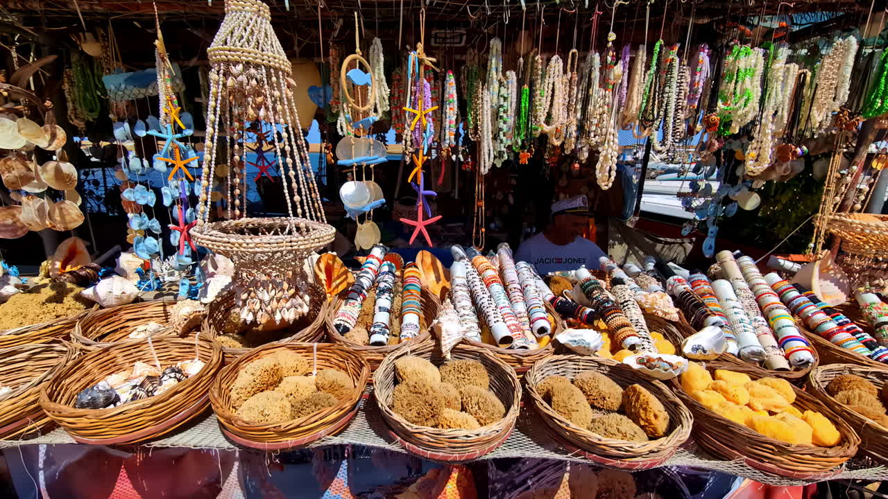 Panoramic boat view riding to Souvenir stalls on the beach in Chania Greece