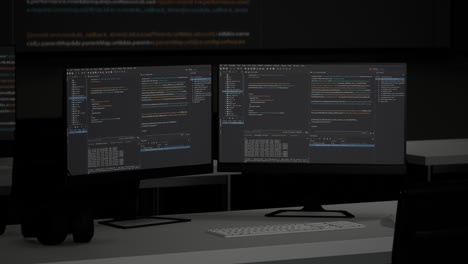 multiple computer screens with code