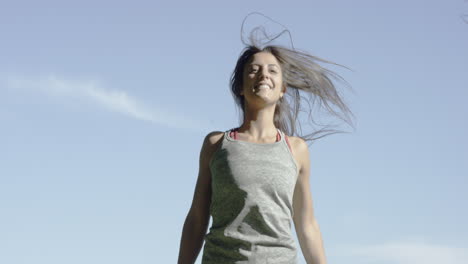 young woman jumping on a trampoline in slow motion