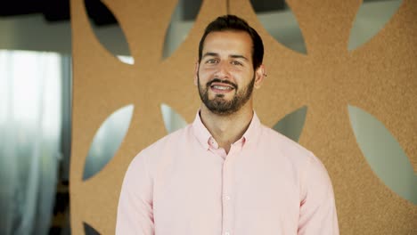 Portrait-of-handsome-guy-who-genuinely-smiling