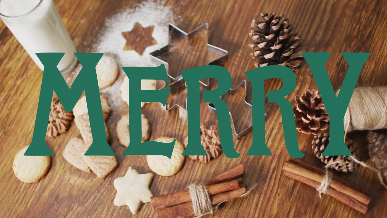 Animation of merry text over christmas decorations on wooden background