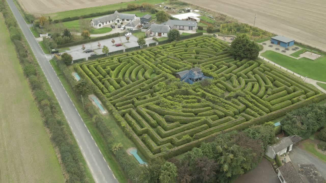 Kildare Maze aerial view with intricate hedges surrounded by rural countryside in Ireland