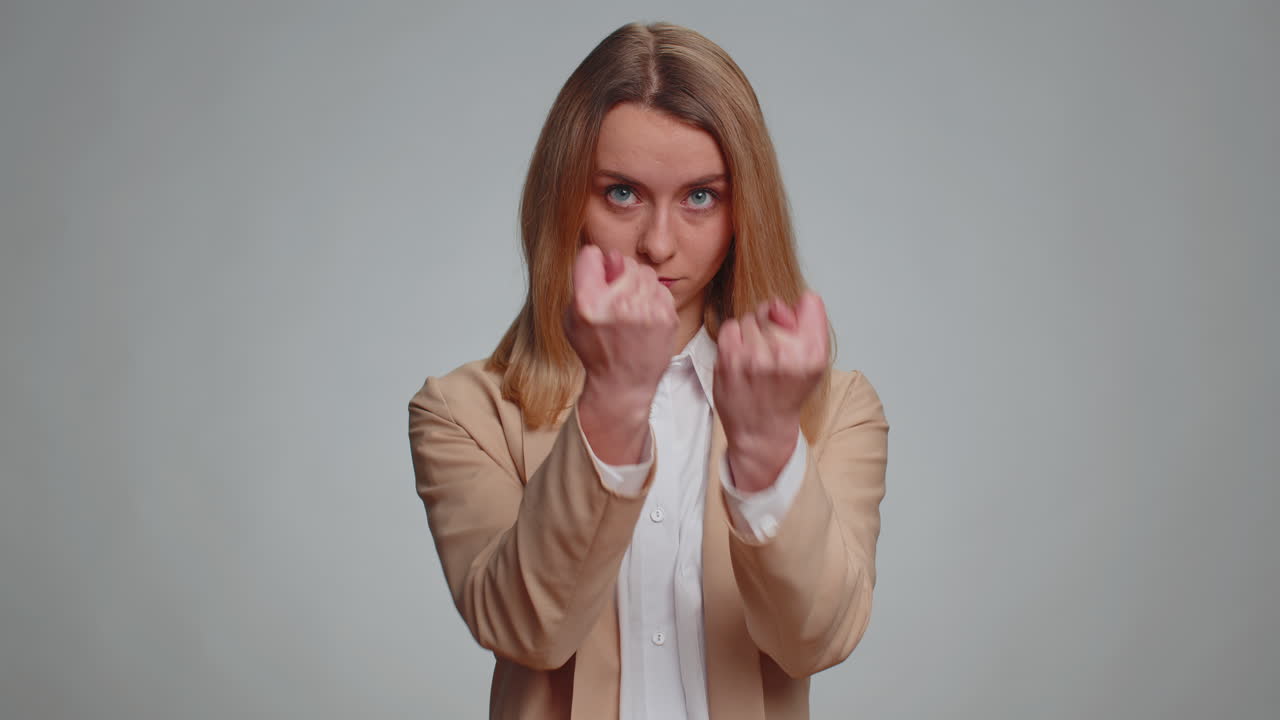 Business woman showing fig negative gesture refusal sign rapacious avaricious acquisitive