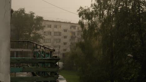 thunderstorm unveils: view from a residential balcony