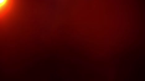 abstract flicker red optical flare light shining from top left on black background with smoke cloud. 4k seamless loop 3d animation. side diagonal flicker light rays simulation effect for overlay.