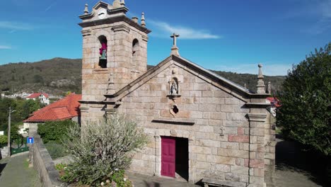 Fly-Above-of-Castro-Laboreiro-Church-in-Portugal-4k