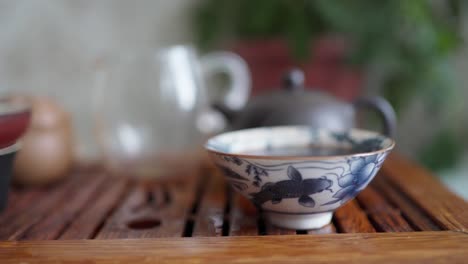 tea ceremony on a portable table. hot tea in a beautiful bowl close-up