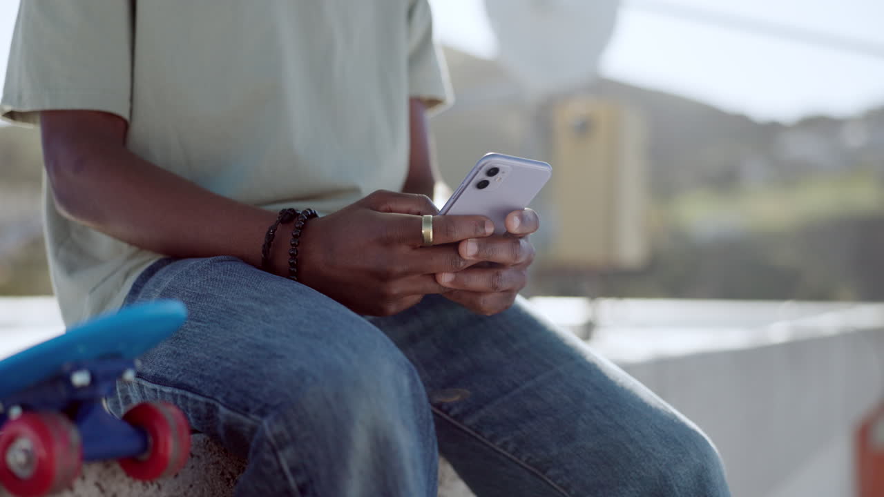 Skater hands, phone or networking on social media