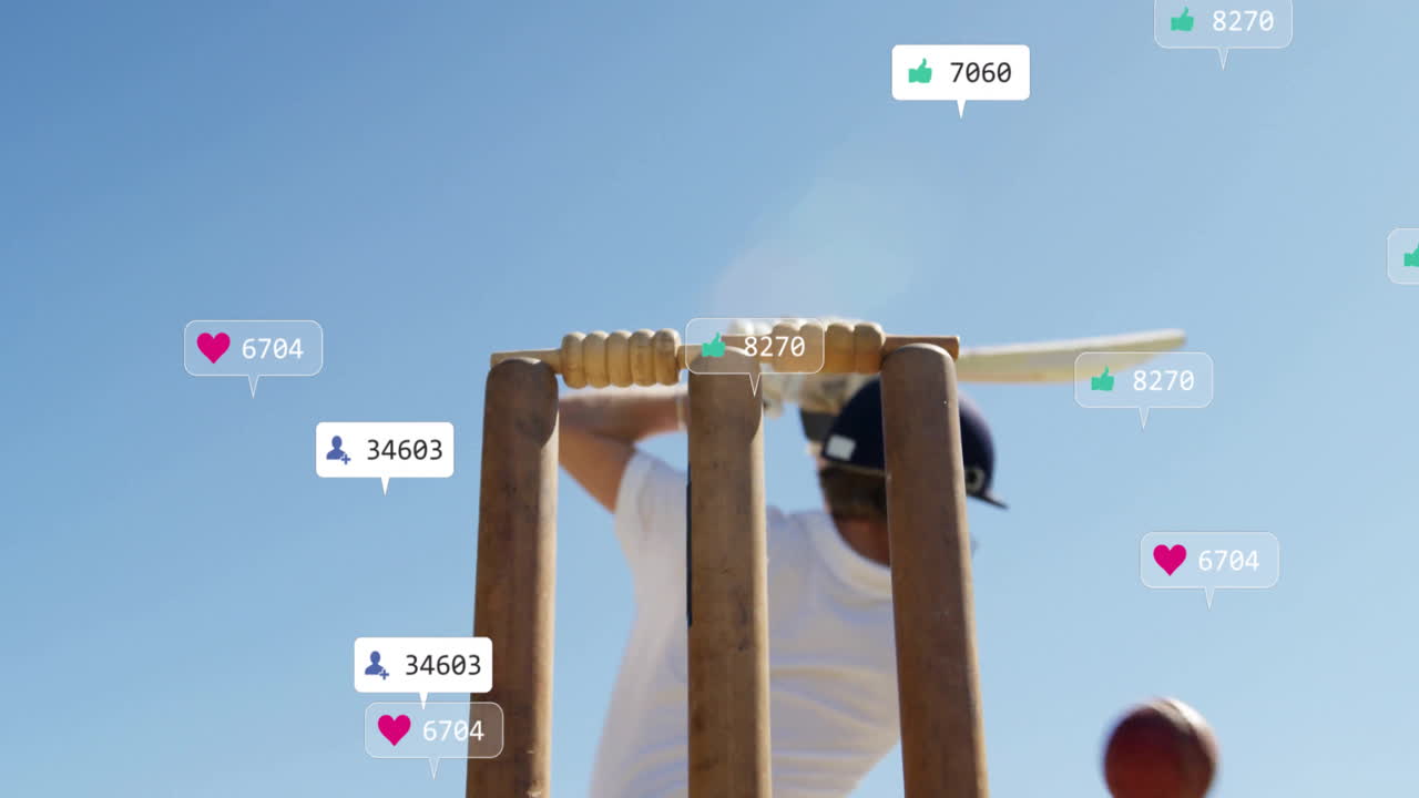 Swinging bat, cricketer with animation of social media icons in clear sky