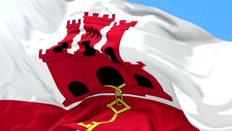 bandera de gibraltar agitando el viento con el cielo azul, bucle