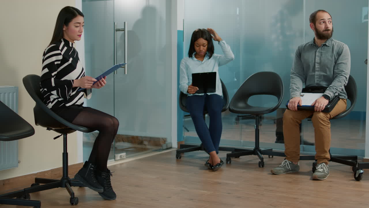 Office worker inviting candidate to enter job interview office