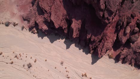 top aerial view of a beautiful purple rock formation in a desert