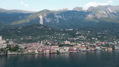 malcesine castle on the waterfront of lake garda and a small town in verona, veneto, italy