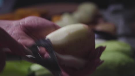 Women's-hands-wash,-peel-and-cut-vegetables-into-vegetable-stew