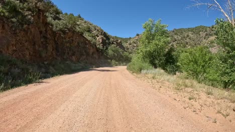 scenic dirt road through a canyon