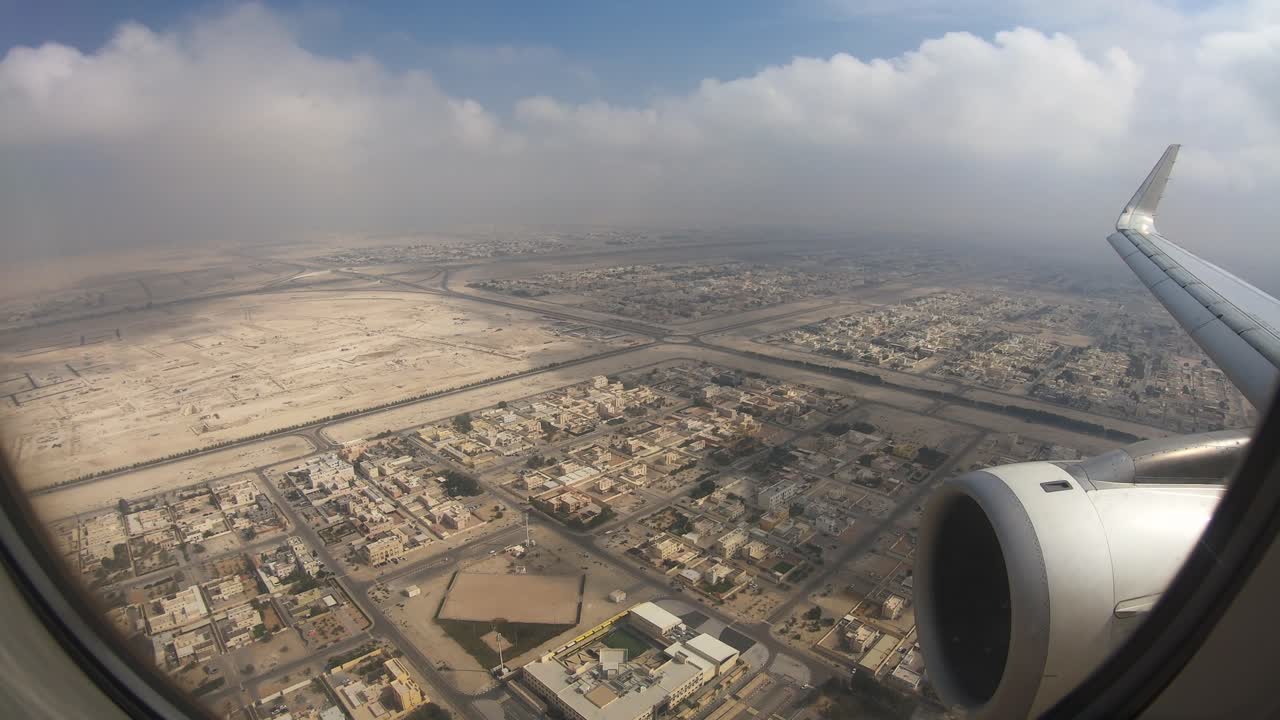 Airplane Window View Above the City of UAE