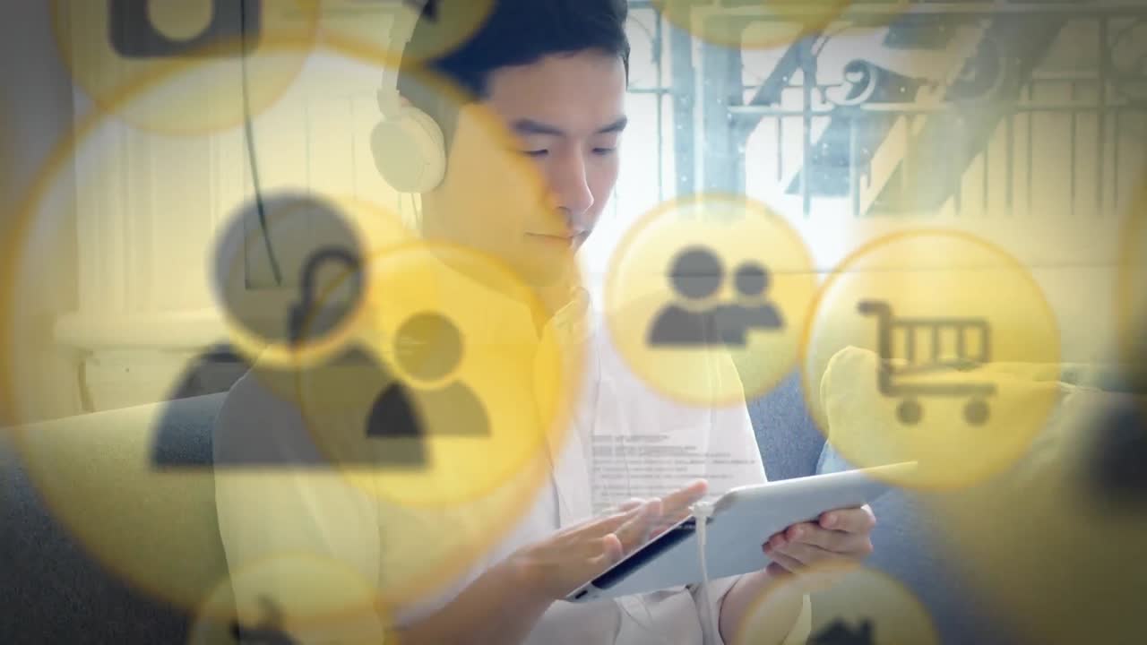 디지털 태블릿을 사용하여 헤드폰을 착용 한 남자에 대한 디지털 아이콘