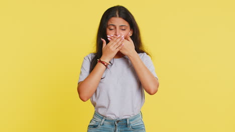 frightened indian woman closing mouth with hands refusing to tell terrible secret unbelievable truth