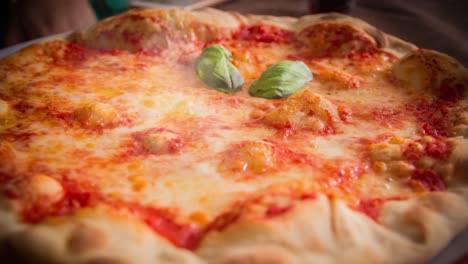 cinemagraph del humo emitido por una pizza italiana caliente