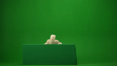 green screen isolated chroma key video capturing a mummy dancing and singing actively into the - green screen isolated chroma key video capturing a mummy dancing and singing actively into the microphone. haloween holidays. mock up, workspace for your promotion clip or advertisement